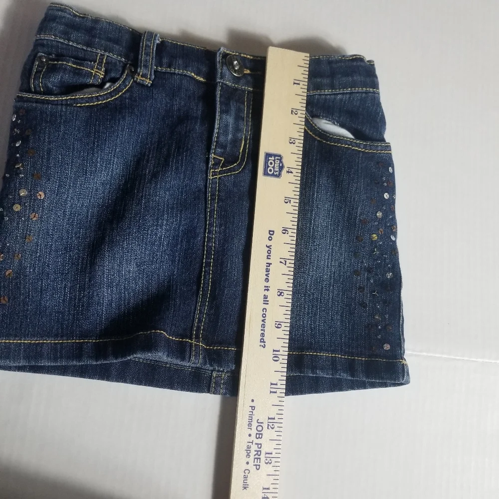 CHILDRENS PLACE JEAN SKIRT SIZE 6 W/SHINY SEQUINS ON FRONT SIDES ATTACHED SHORTS
